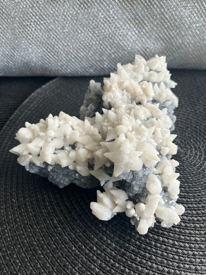 Fluorescent Mangano Dog Tooth Calcite on Druze Quartz