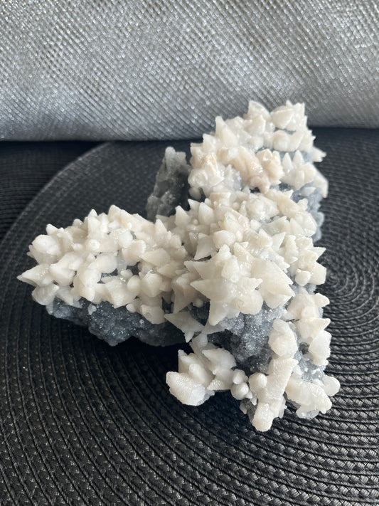 Fluorescent Mangano Dog Tooth Calcite on Druze Quartz