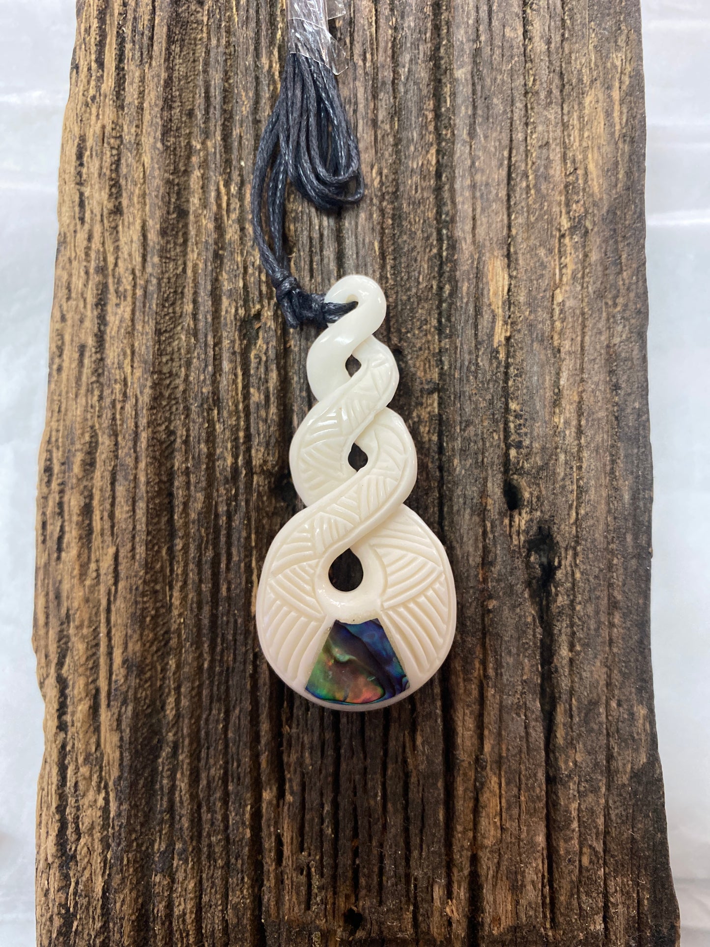 Triple Twist Bone Carving